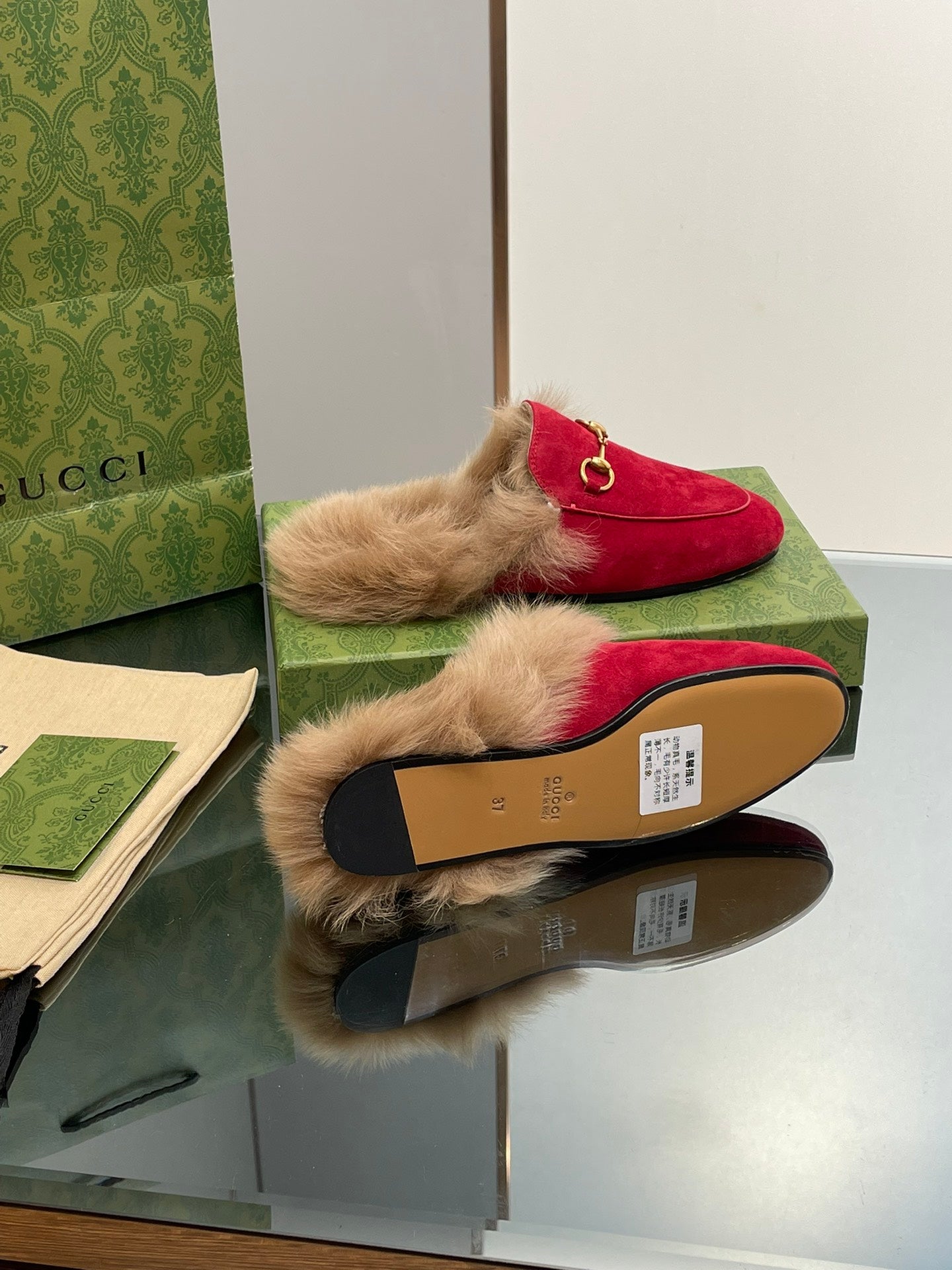 GUCCI HORSEBIT MULE IN CRIMSON RED SUEDE AND LAMB WOOL LINING