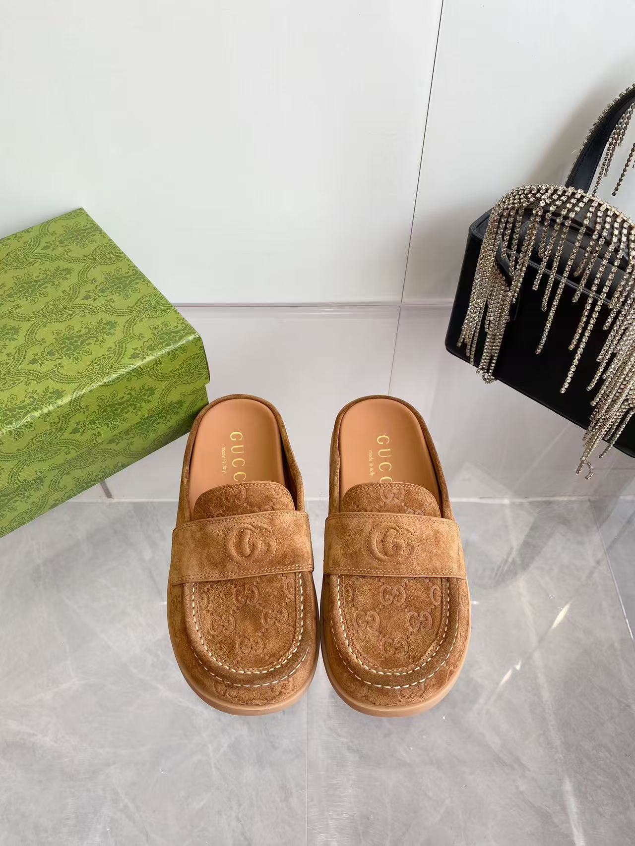 GUCCI LOAFERS IN BROWN MONOGRAM EMBOSSED SUEDE