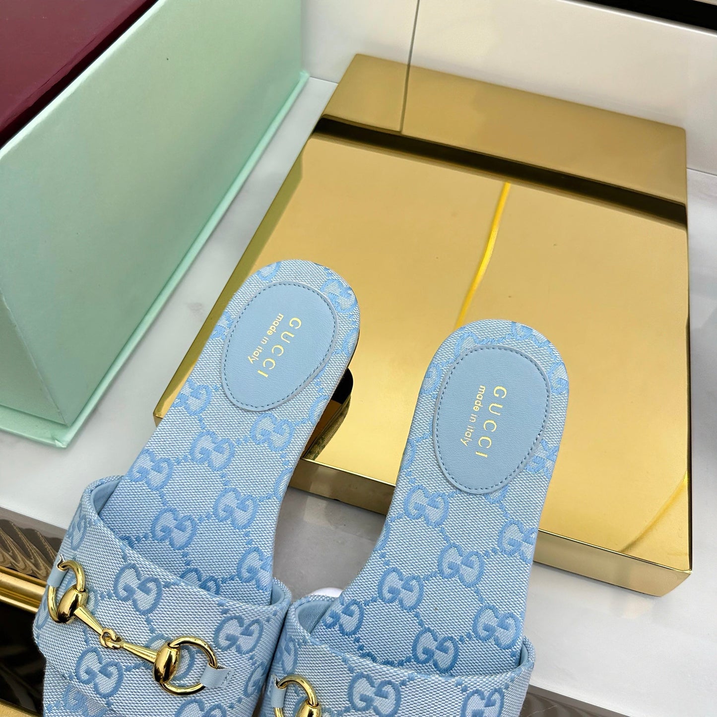 GUCCI SLIDES IN BLUE WITH GOLD HARDWARE
