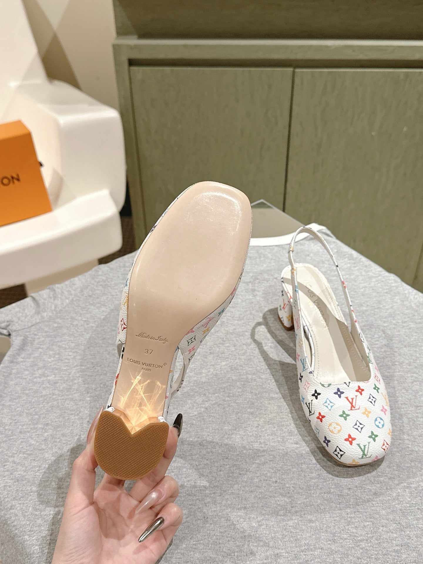 LOUIS VUITTON SWING SLINGBACK PUMP 55 MM IN WHITE MONOGRAM CALFSKIN