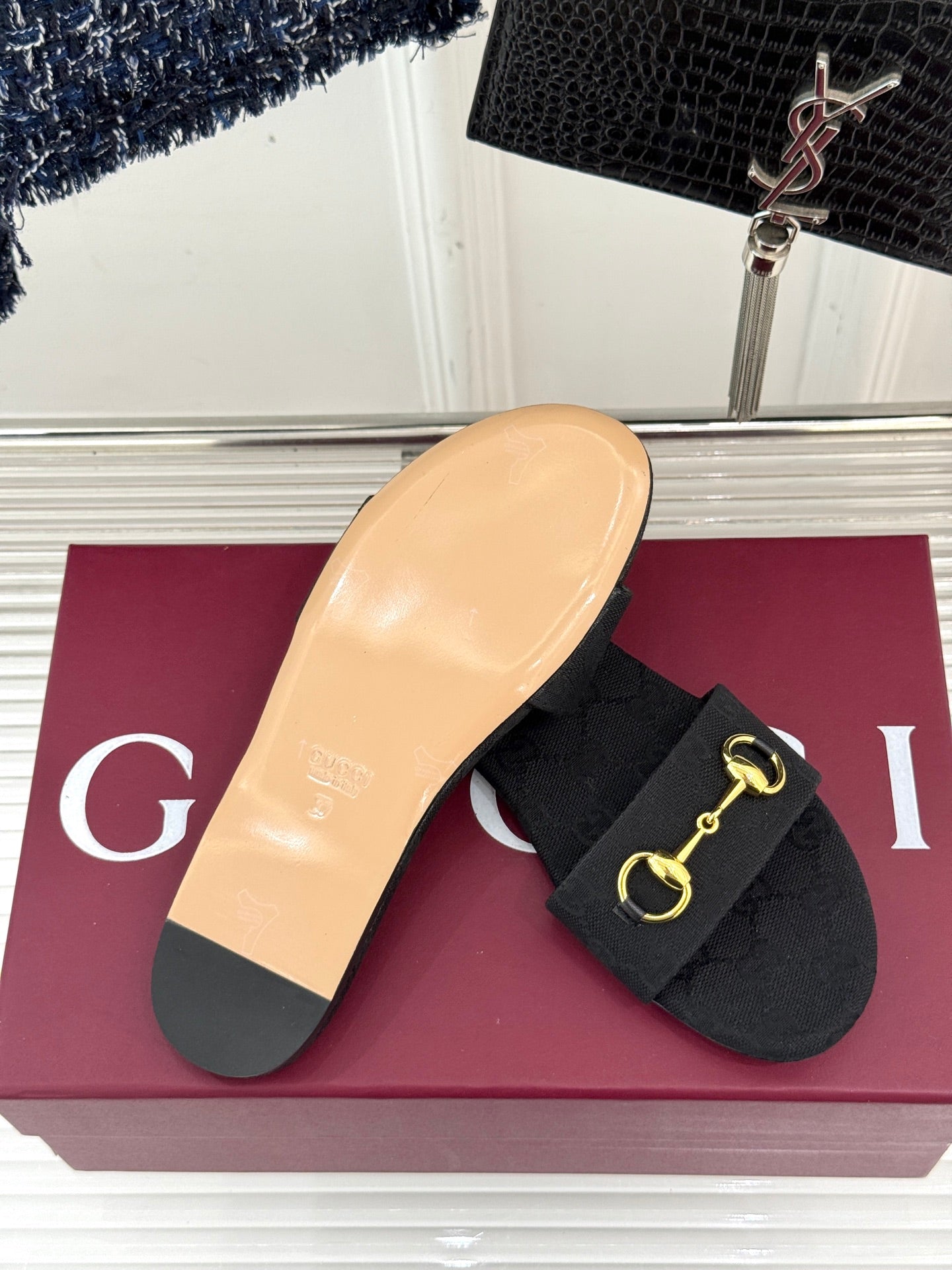 GUCCI SLIDE SANDALS IN BLACK FABRIC EMBOSSED LOGO