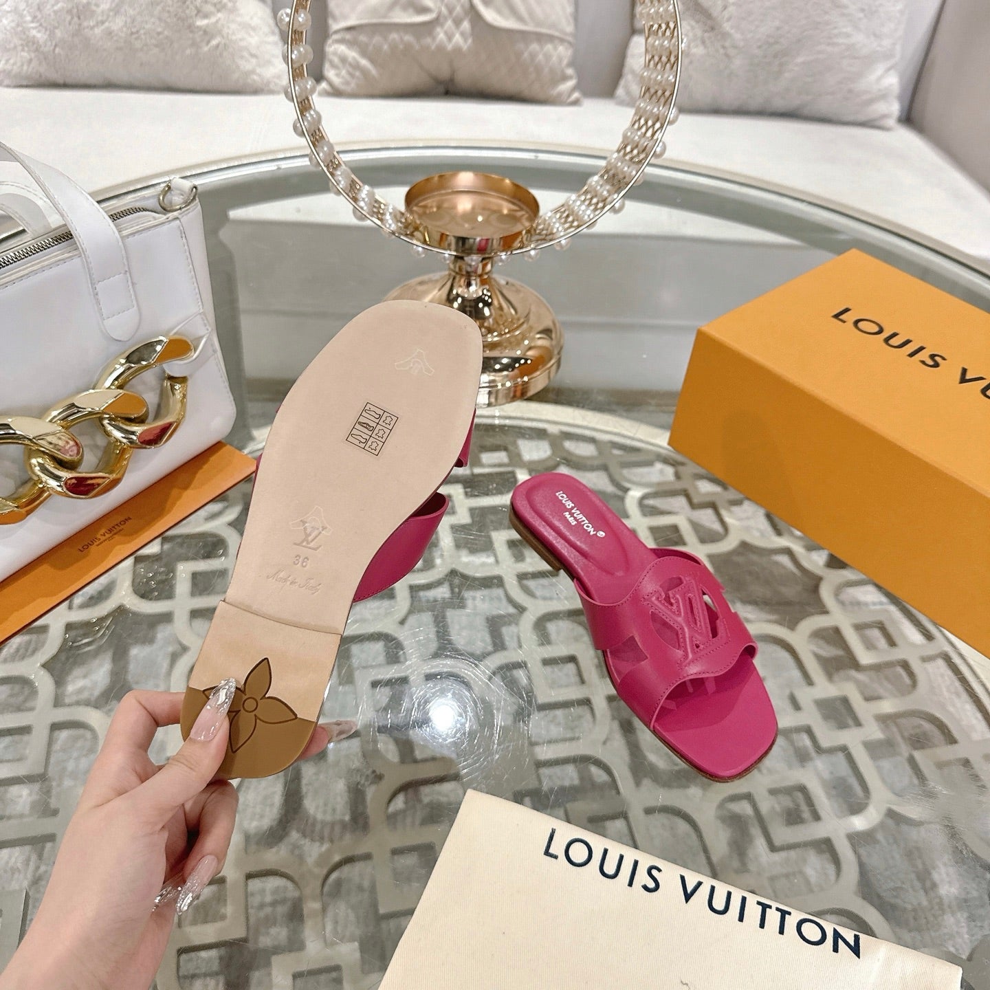 LOUIS VUITTON ISOLA FLAT SLIDE IN DARK PINK CALFSKIN