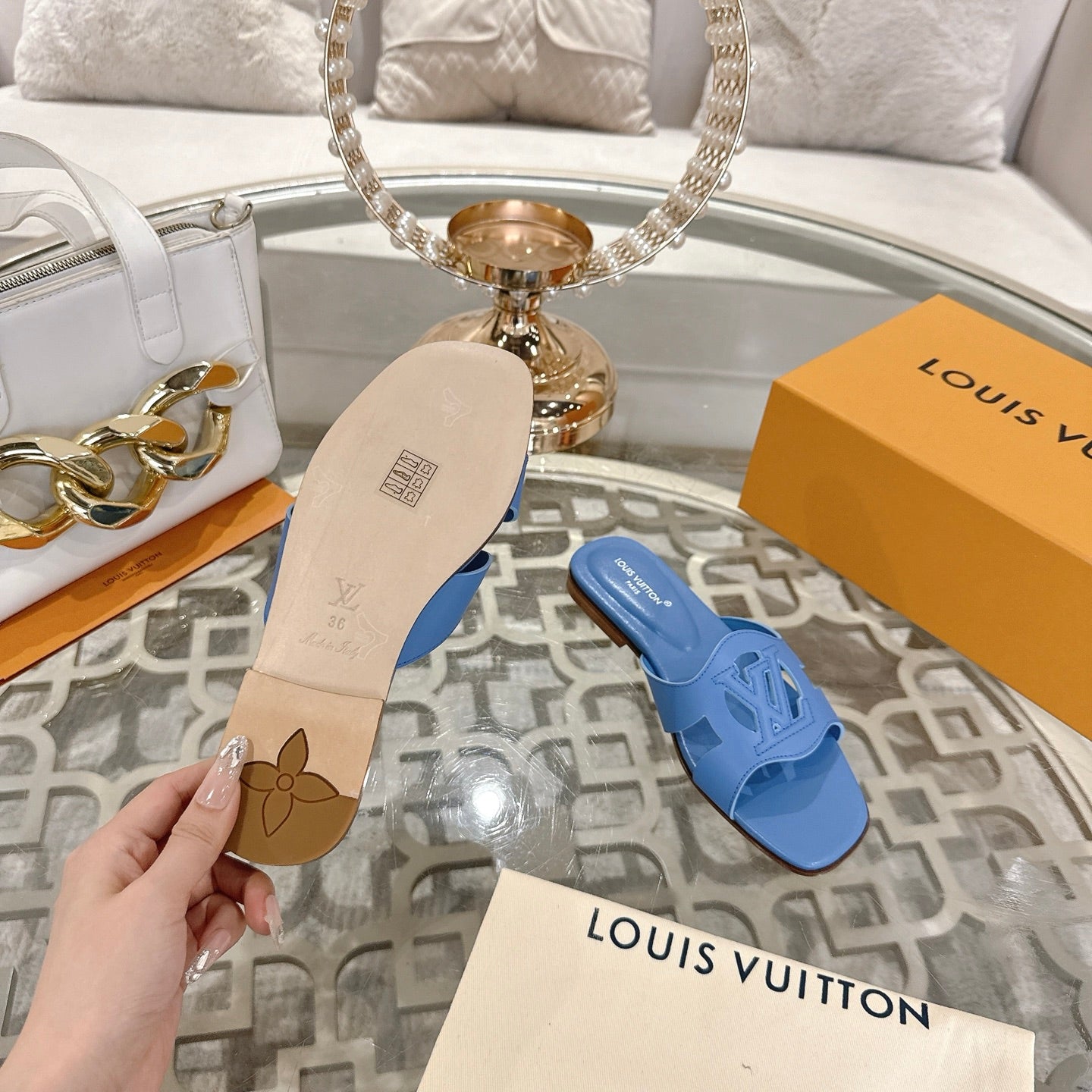 LOUIS VUITTON ISOLA FLAT SLIDE IN CORNFLOWER BLUE CALFSKIN