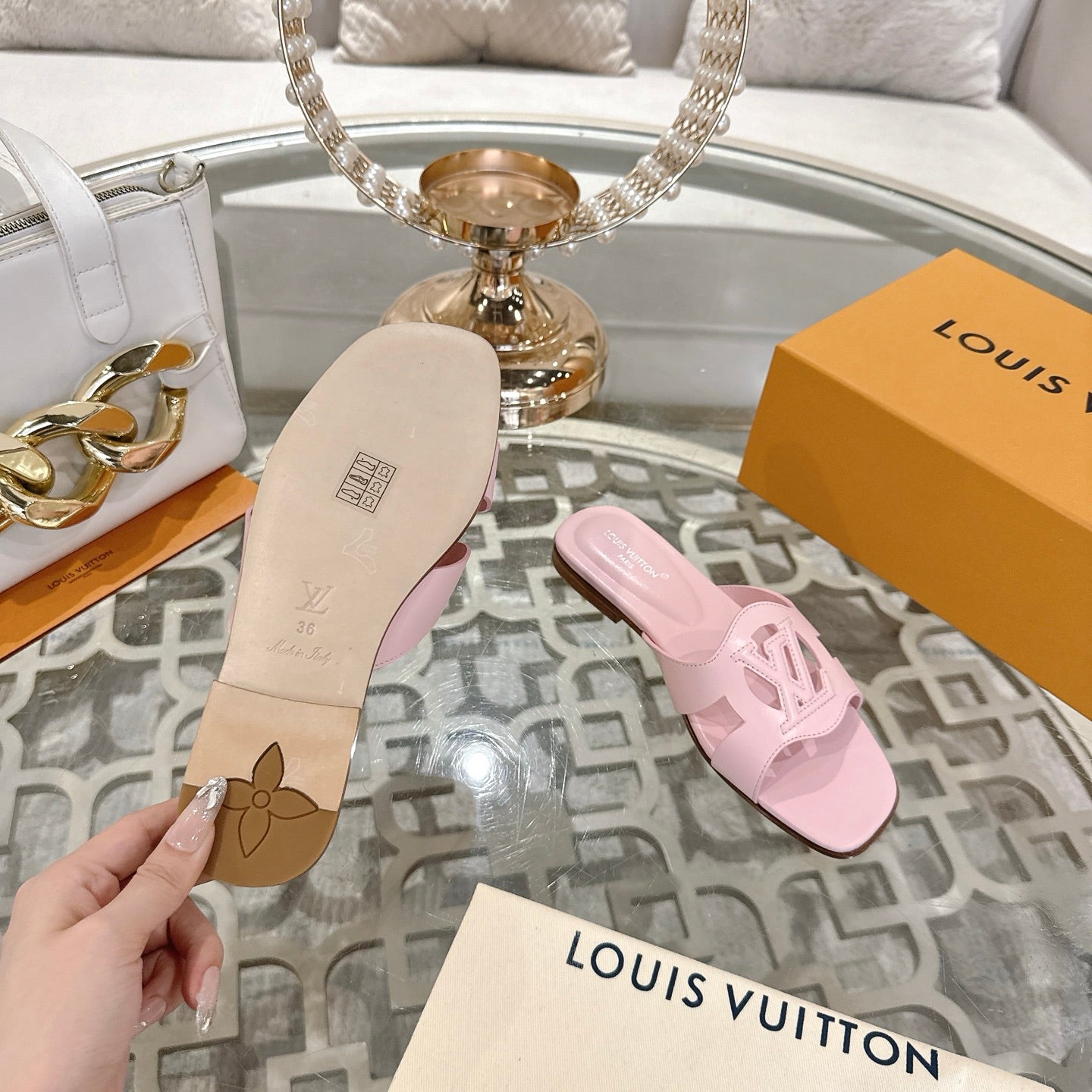 LOUIS VUITTON ISOLA FLAT SLIDE IN PASTEL PINK CALFSKIN
