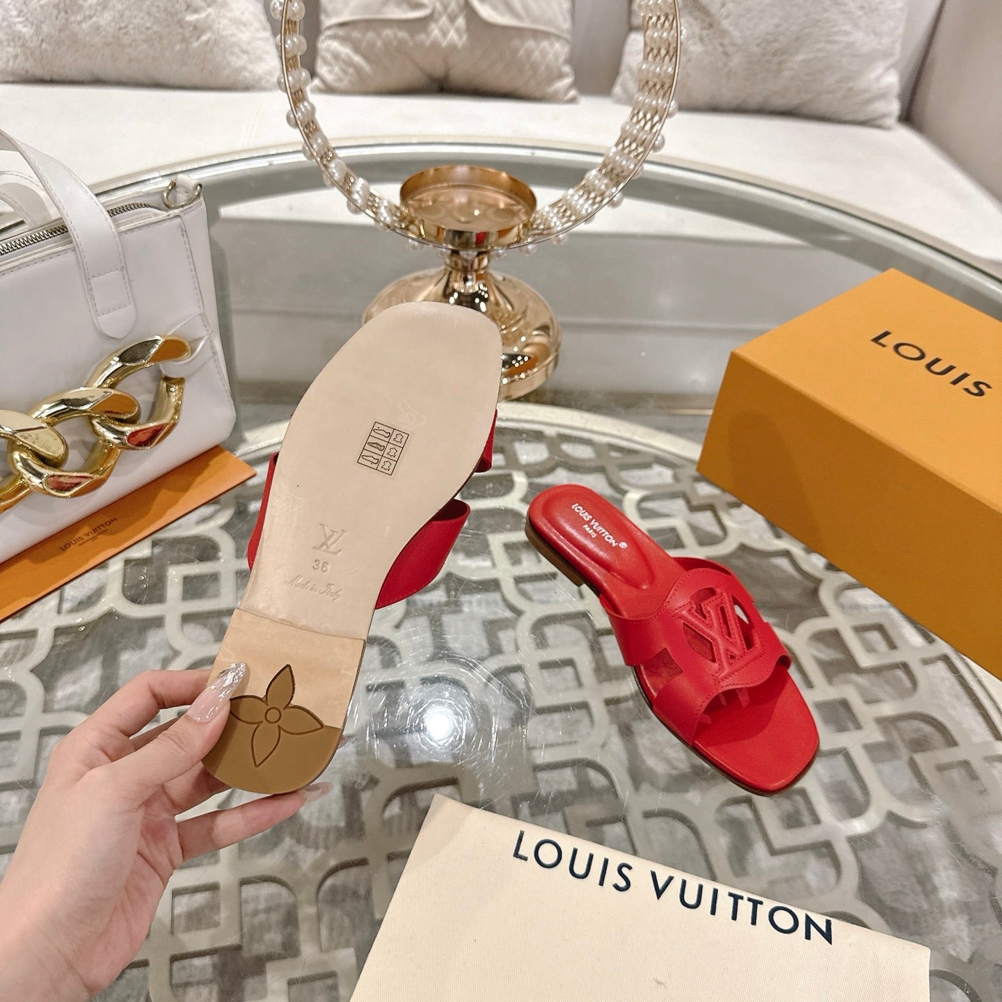 LOUIS VUITTON ISOLA FLAT SLIDE IN CHERRY RED CALFSKIN
