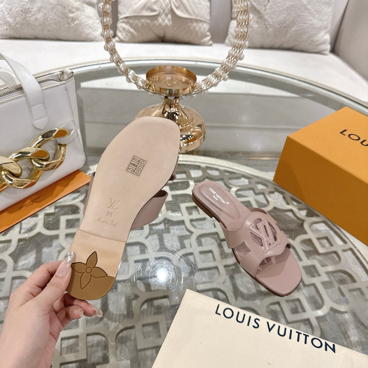 LOUIS VUITTON ISOLA FLAT SLIDE IN DUSTY PINK CALFSKIN