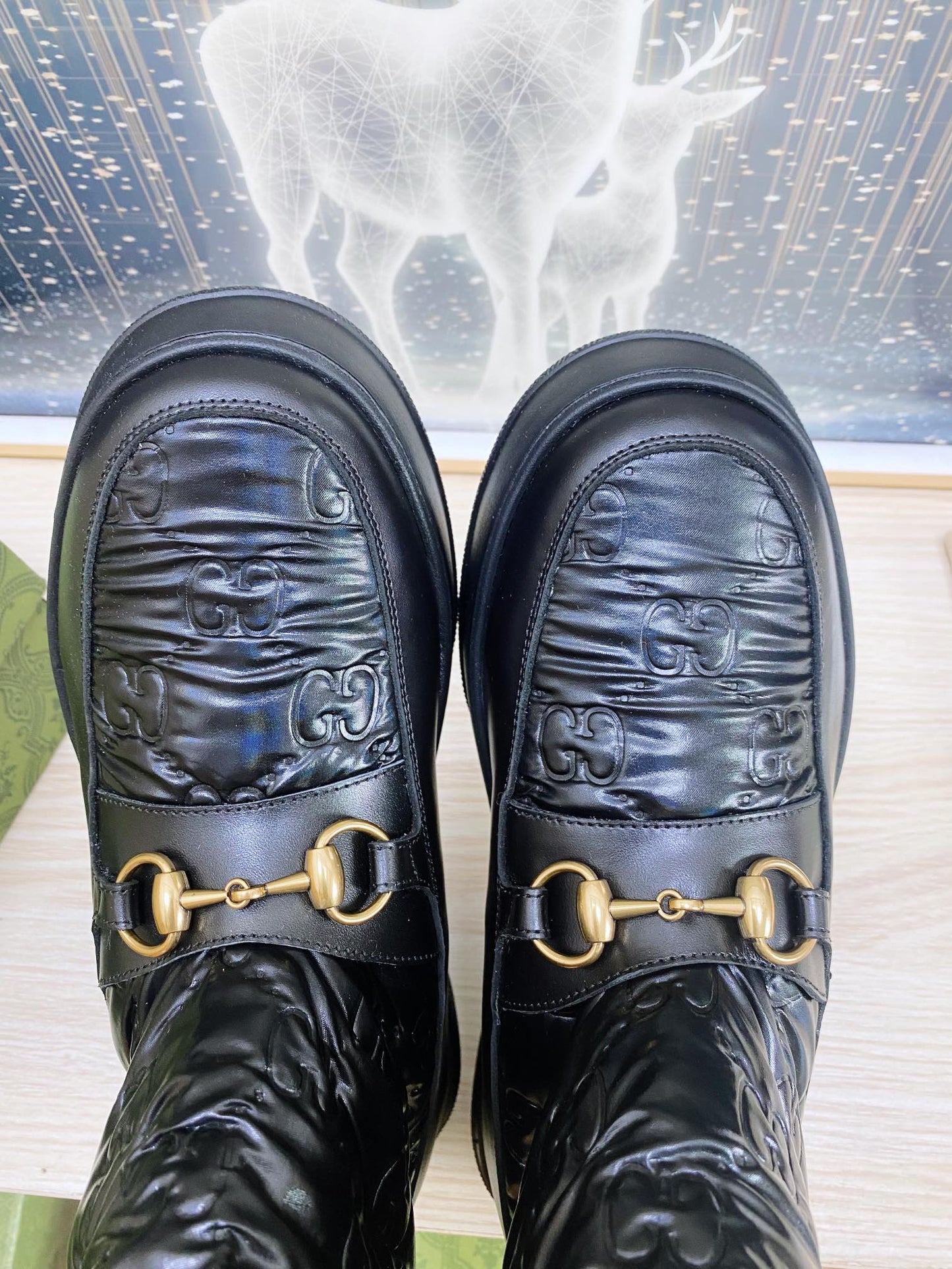 GUCCI HORSEBIT ANKLE BOOTS WITH MERINO TRIM IN BLACK EMBOSSED CALFSKIN