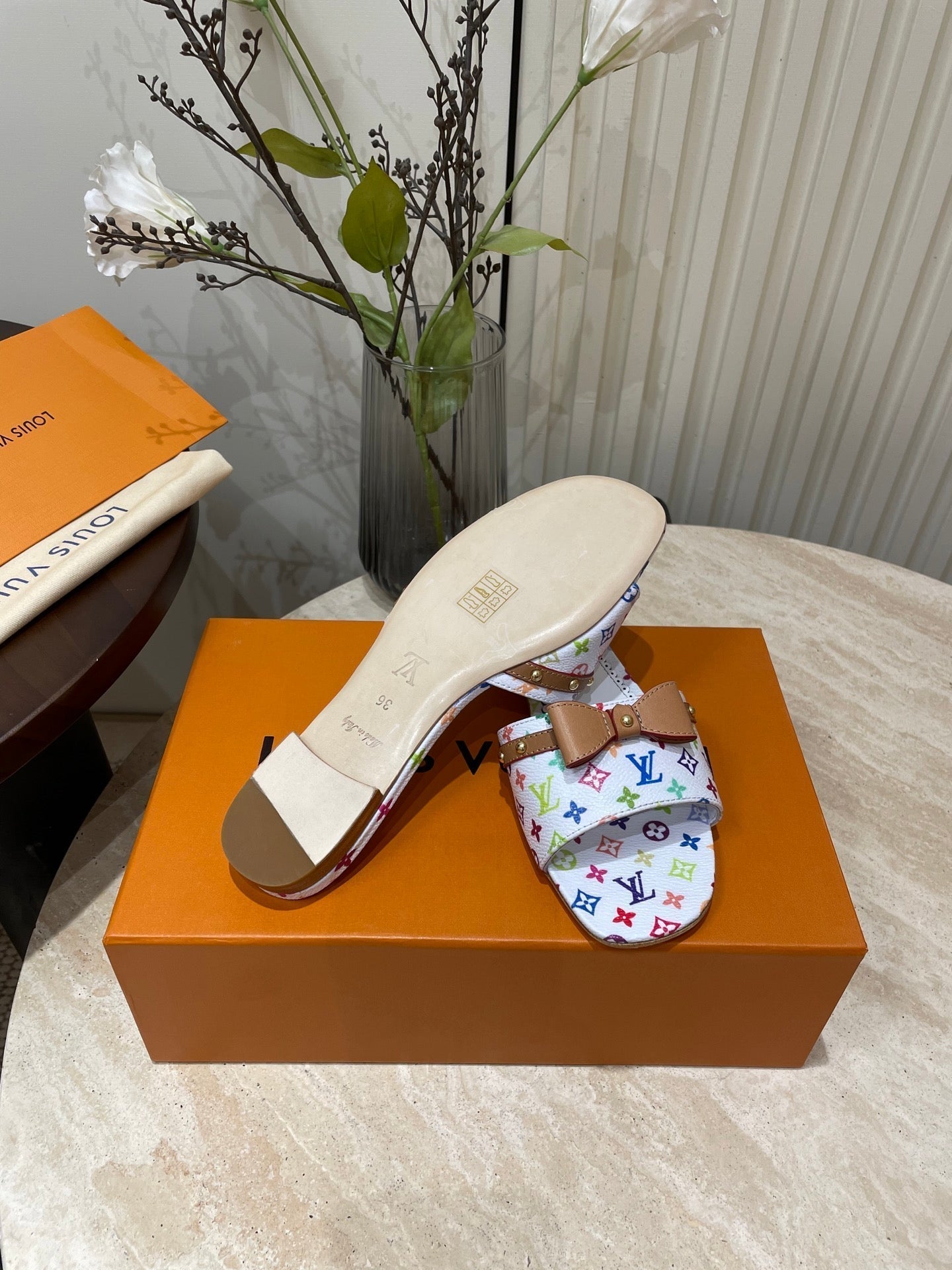 LOUIS VUITTON FLAT MULES IN WHITE MONOGRAM LAMBSKIN
