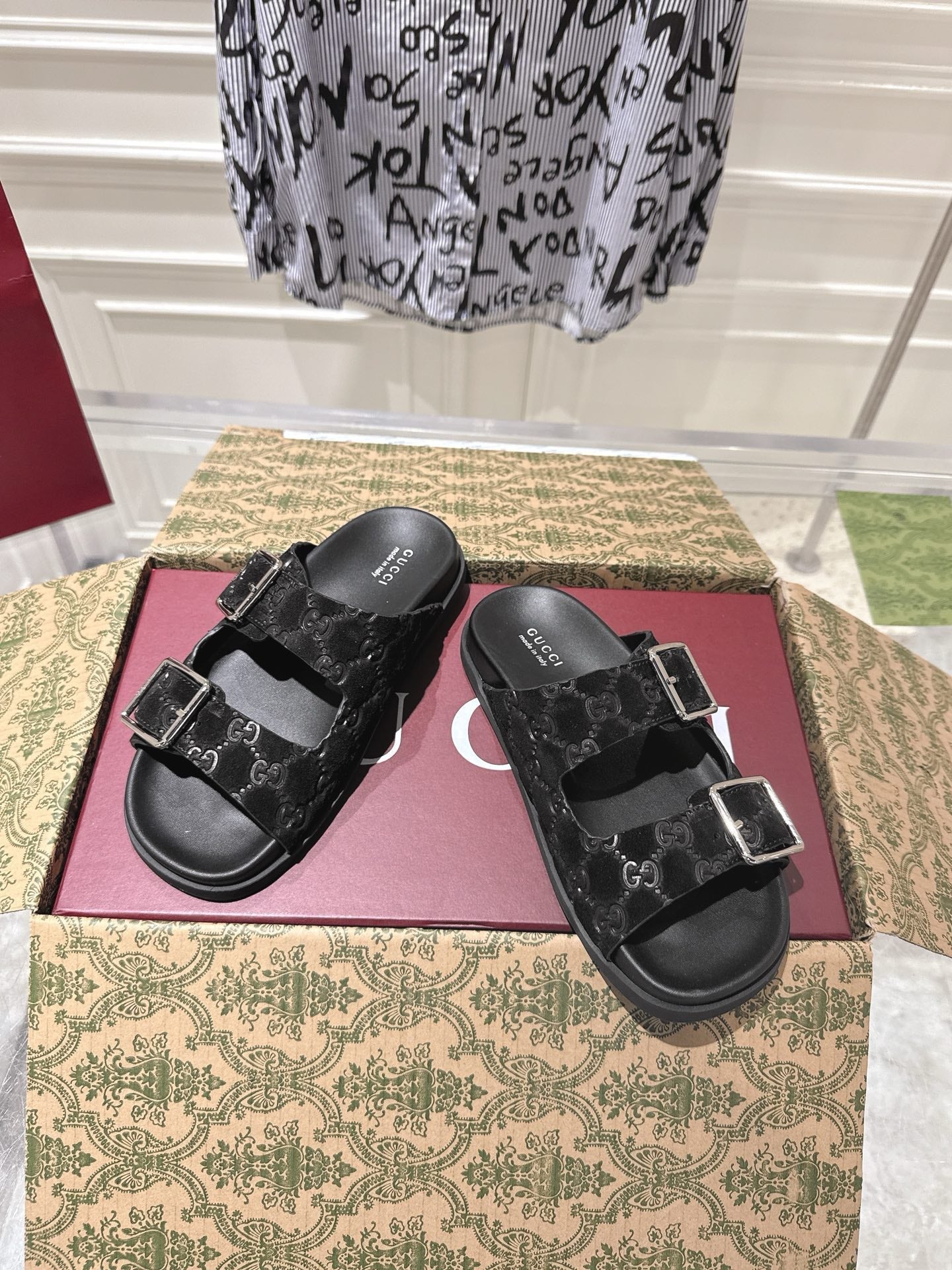 GUCCI SANDALS IN BLACK SUEDE EMBOSSED LOGO SILVER HARDWARE