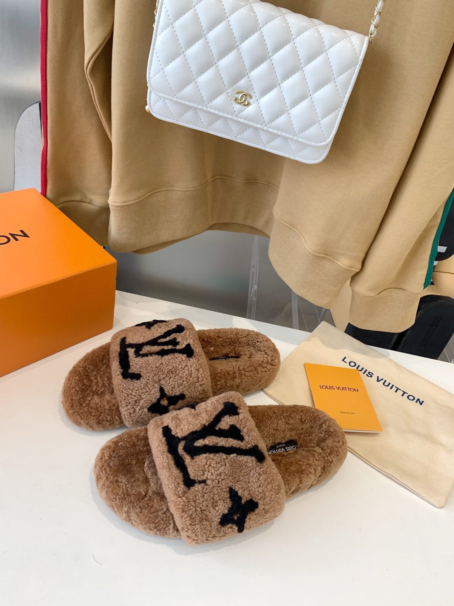 LOUIS VUITTON LV WOMEN'S PASEO FLAT SLIPPER IN CARAMEL BROWN FLEECE WITH BLACK LOGO
