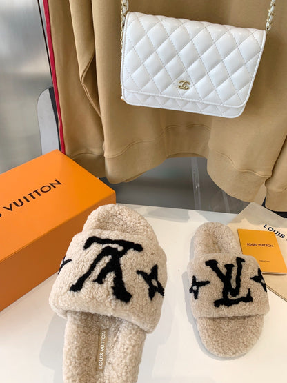 LOUIS VUITTON LV WOMEN'S PASEO FLAT SLIPPER IN TAN BROWN FLEECE WITH BLACK LOGO