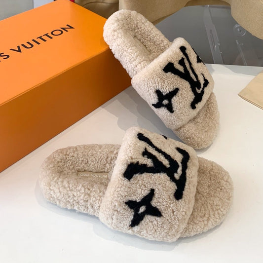 LOUIS VUITTON LV WOMEN'S PASEO FLAT SLIPPER IN TAN BROWN FLEECE WITH BLACK LOGO