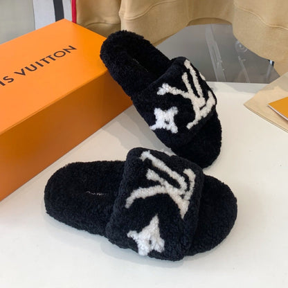 LOUIS VUITTON LV WOMEN'S PASEO FLAT SLIPPER IN BLACK FLEECE WITH WHITE LOGO
