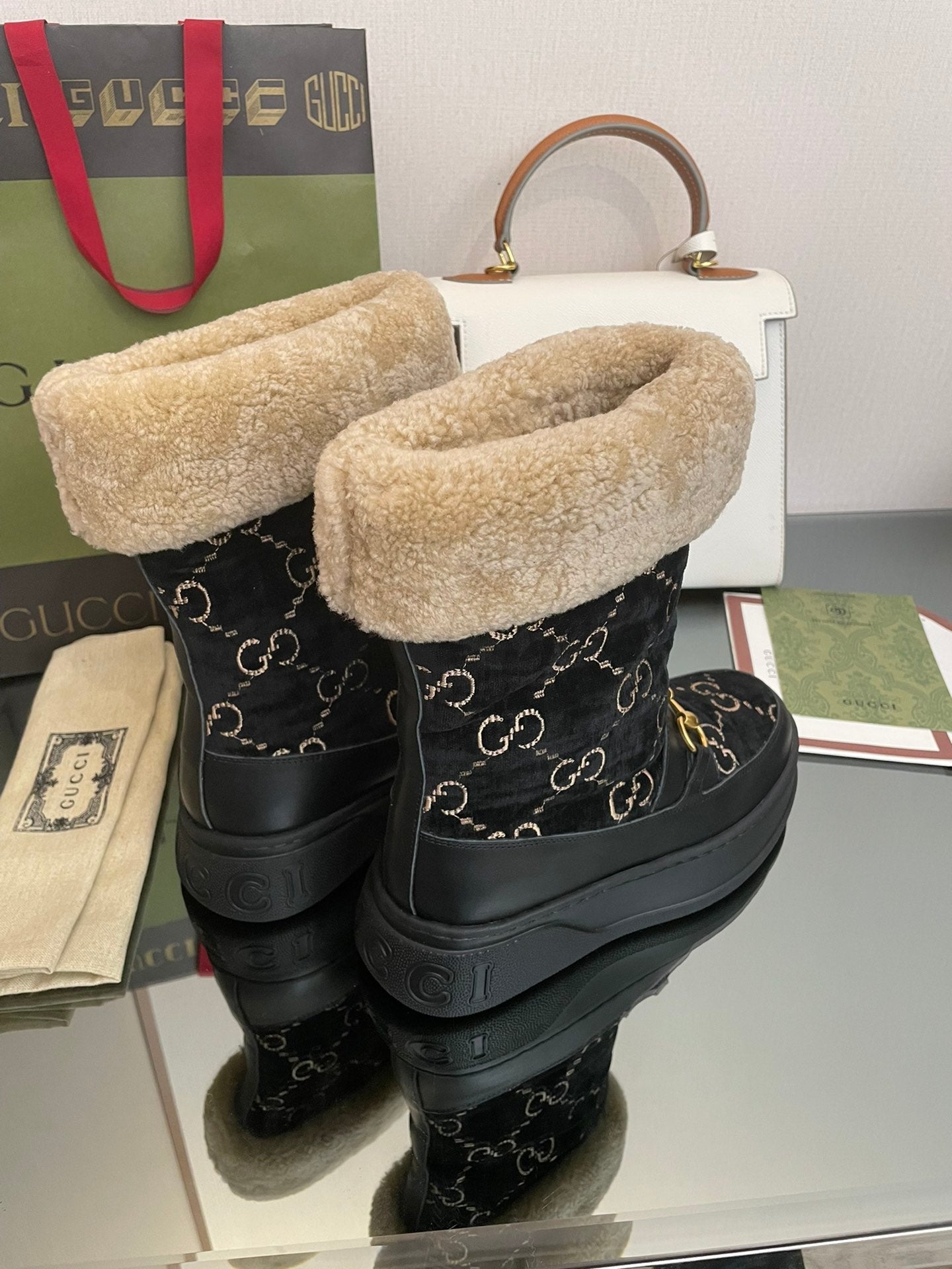 GUCCI HORSEBIT SNOW ANKLE BOOTS IN BLACK MONOGRAM VELVET MIX CALFSKIN AND LAMB WOOL LINING