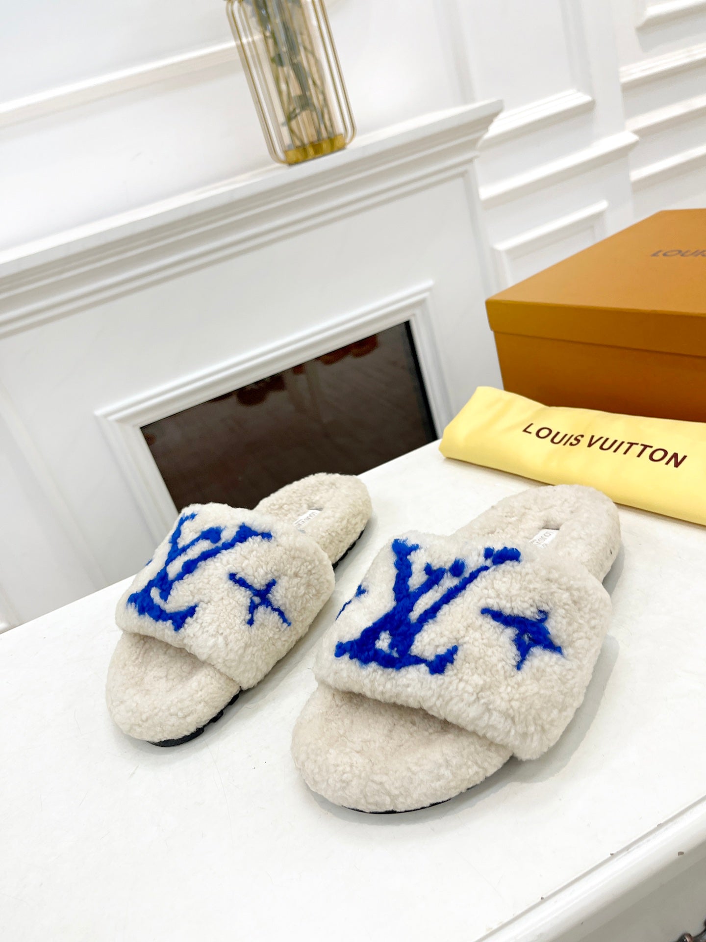 LOUIS VUITTON LV FLAT SLIPPER IN WHITE MIX COBALT BLUE SHEARLING