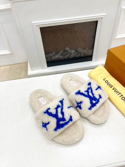 LOUIS VUITTON LV FLAT SLIPPER IN WHITE MIX COBALT BLUE SHEARLING