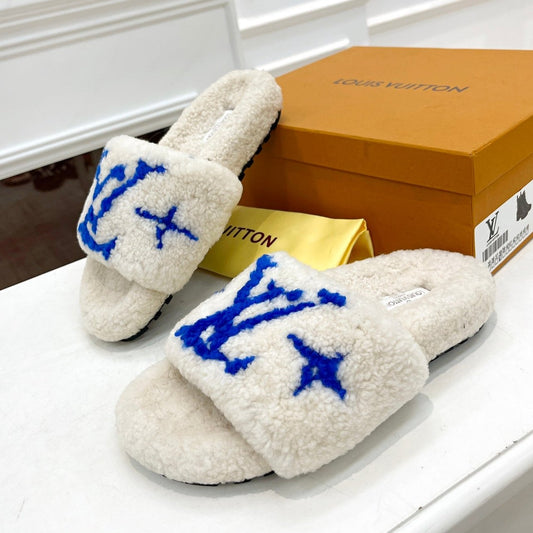 LOUIS VUITTON LV FLAT SLIPPER IN WHITE MIX COBALT BLUE SHEARLING