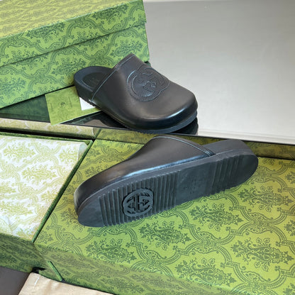 GUCCI INTERLOCKING G MULE IN BLACK CALFSKIN
