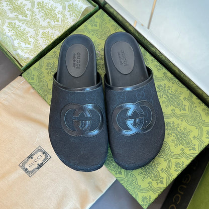 GUCCI INTERLOCKING G MULE IN BLACK MONOGRAM CANVAS AND LEATHER