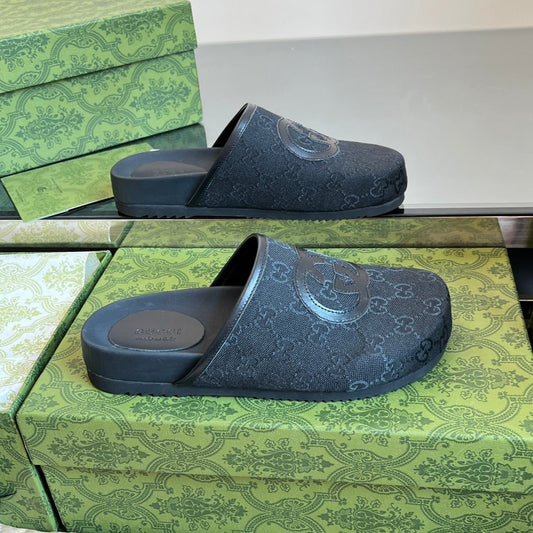 GUCCI INTERLOCKING G MULE IN BLACK MONOGRAM CANVAS AND LEATHER