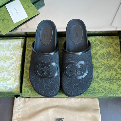 GUCCI INTERLOCKING G MULE IN BLACK MONOGRAM CANVAS AND LEATHER