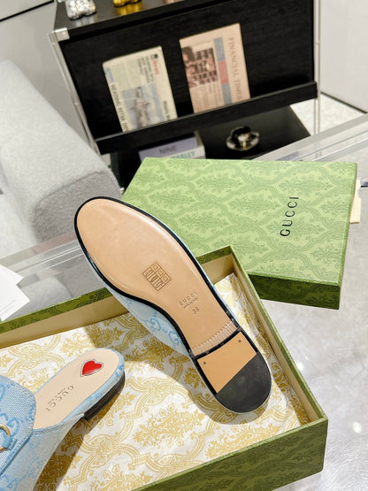 GUCCI MEN'S MULE WITH HORSEBIT IN LIGHT BLUE MONOGRAM JACQUARD FABRIC