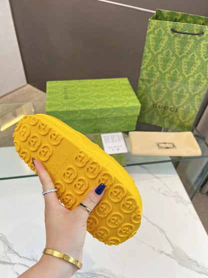 GUCCI PLATFORM SANDALS IN BRIGHT YELLOW MONOGRAM IMPORTED TPU