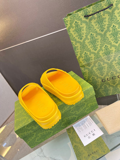 GUCCI PLATFORM SANDALS IN BRIGHT YELLOW MONOGRAM IMPORTED TPU