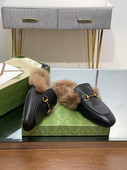 GUCCI HORSEBIT MULE IN BLACK CALFSKIN AND LAMB WOOL LINING