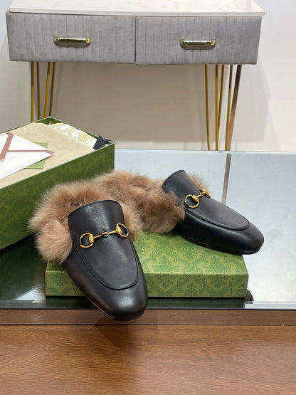 GUCCI HORSEBIT MULE IN BLACK CALFSKIN AND LAMB WOOL LINING