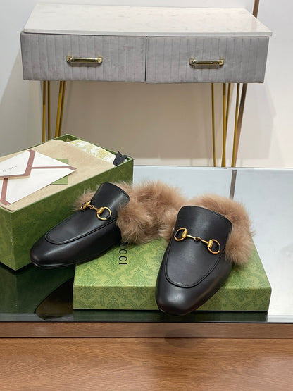 GUCCI HORSEBIT MULE IN BLACK CALFSKIN AND LAMB WOOL LINING