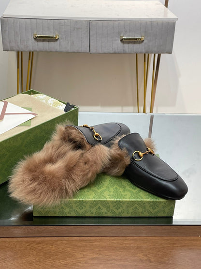GUCCI HORSEBIT MULE IN BLACK CALFSKIN AND LAMB WOOL LINING