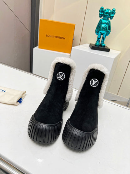 LOUIS VUITTON LV RUBY FLAT ANKLE BOOT IN BLACK SUEDE CALF LEATHER AND WHITE SHEARLING