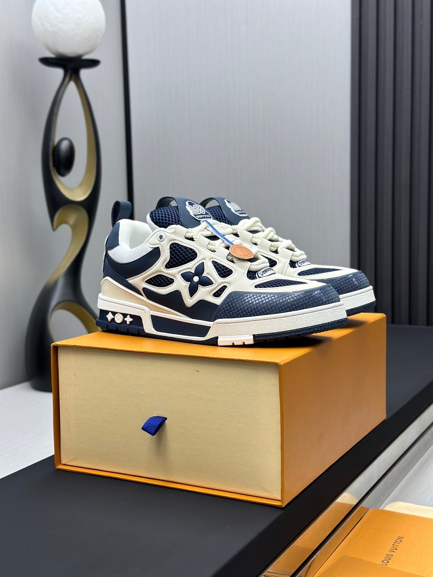 LOUIS VUITTON LV SKATE SNEAKER IN WHITE MIX NAVY BLUE CALFSKIN