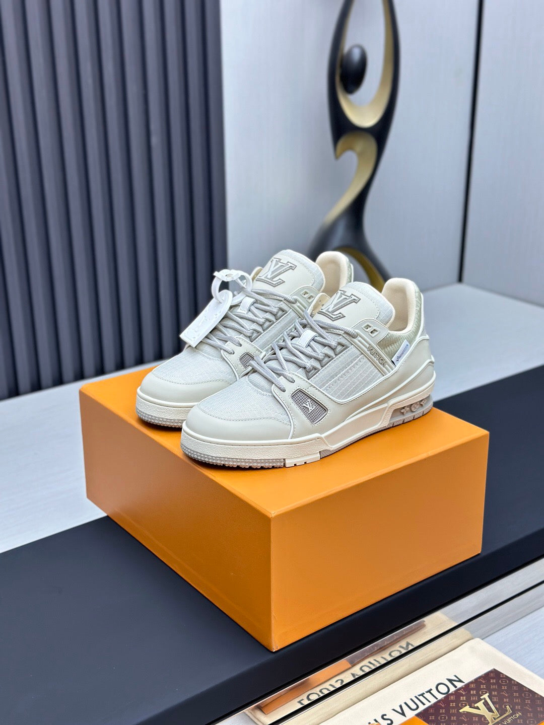 LOUIS VUITTON LV TRAINER SNEAKER IN GREY CALFSKIN