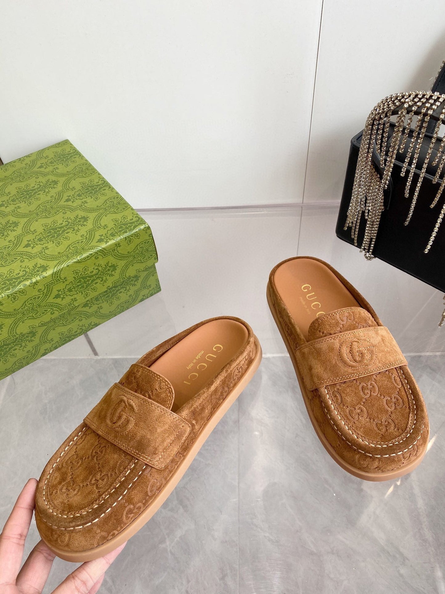GUCCI LOAFERS IN BROWN MONOGRAM EMBOSSED SUEDE