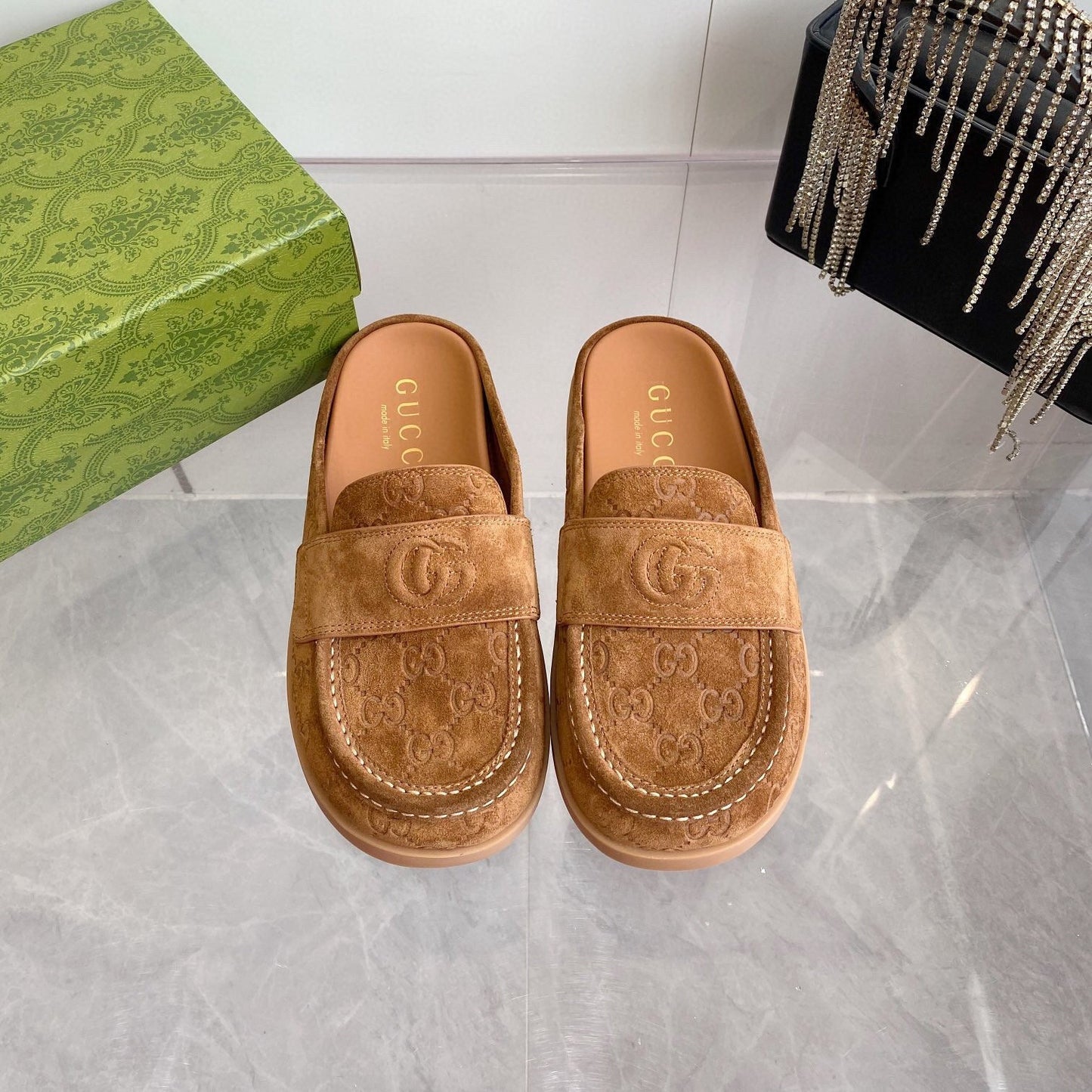 GUCCI LOAFERS IN BROWN MONOGRAM EMBOSSED SUEDE