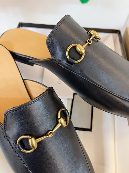 GUCCI SLIPPER MULES BLACK