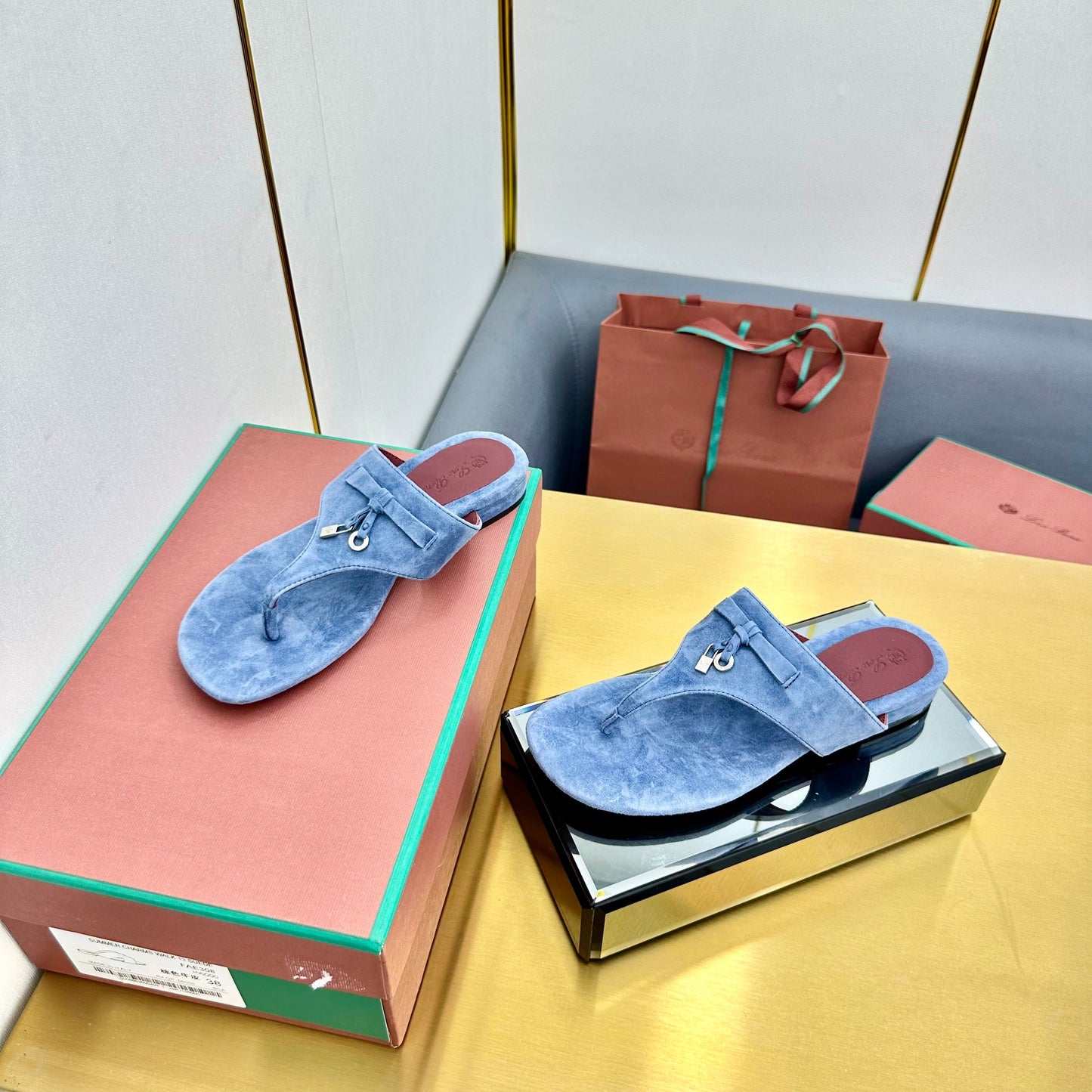FLIP FLOPS IN BLUE SUEDE AND HARDWARE SILVER