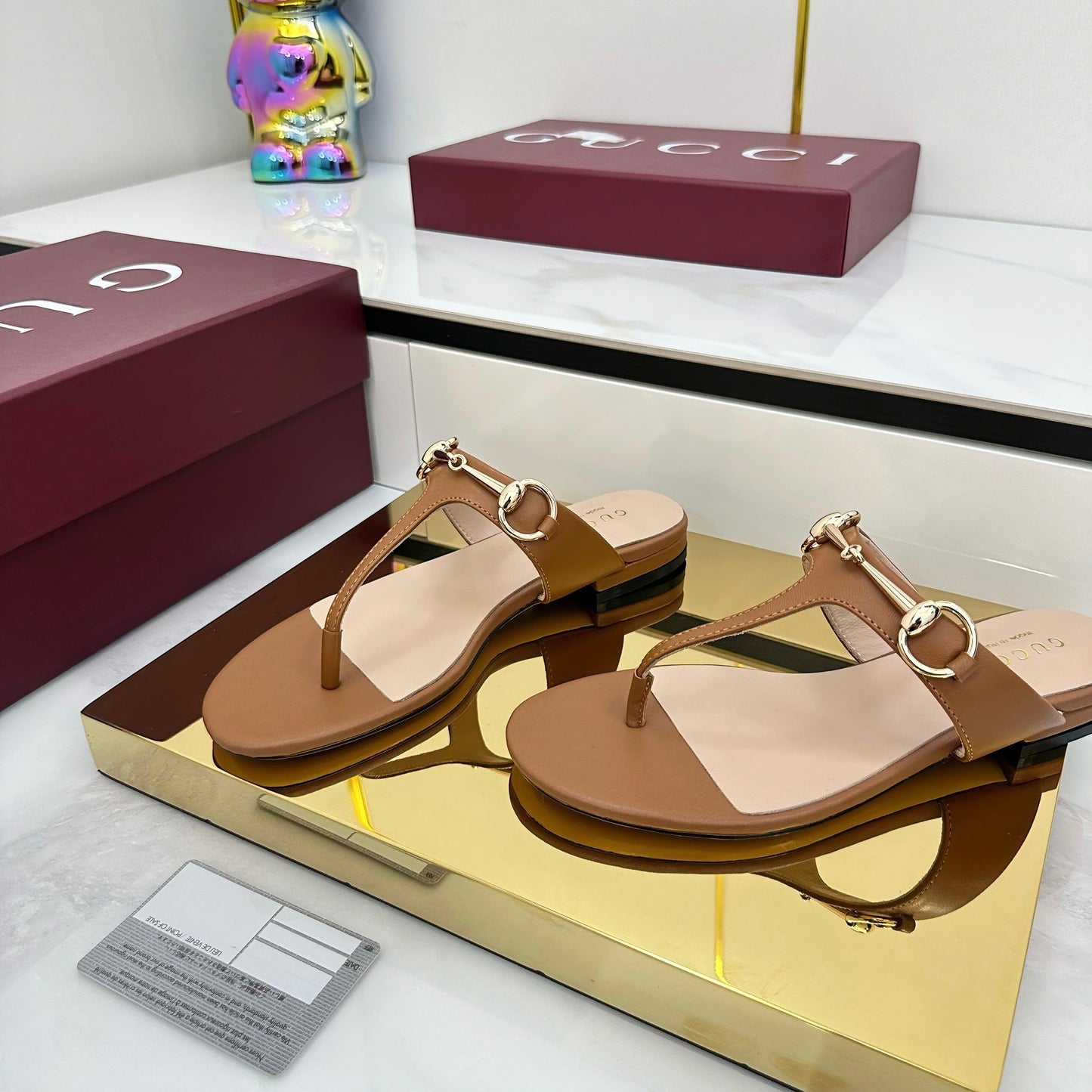 GUCCI THONG SANDALS IN BROWN LAMBSKIN WITH GOLD HARDWARE
