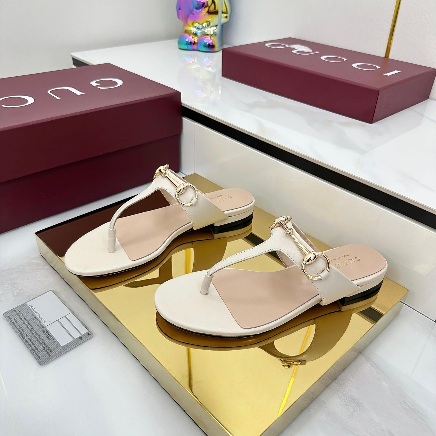 GUCCI THONG SANDALS IN CREAM WHITE LAMBSKIN WITH GOLD HARDWARE