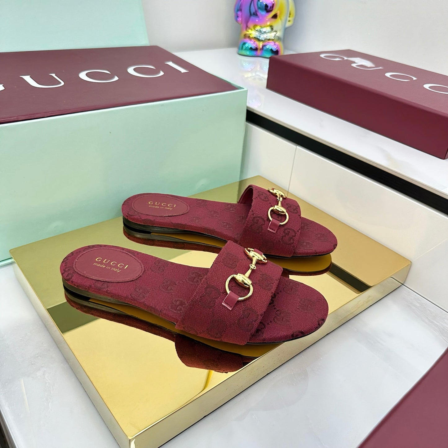GUCCI SLIDES IN RED WITH GOLD HARDWARE