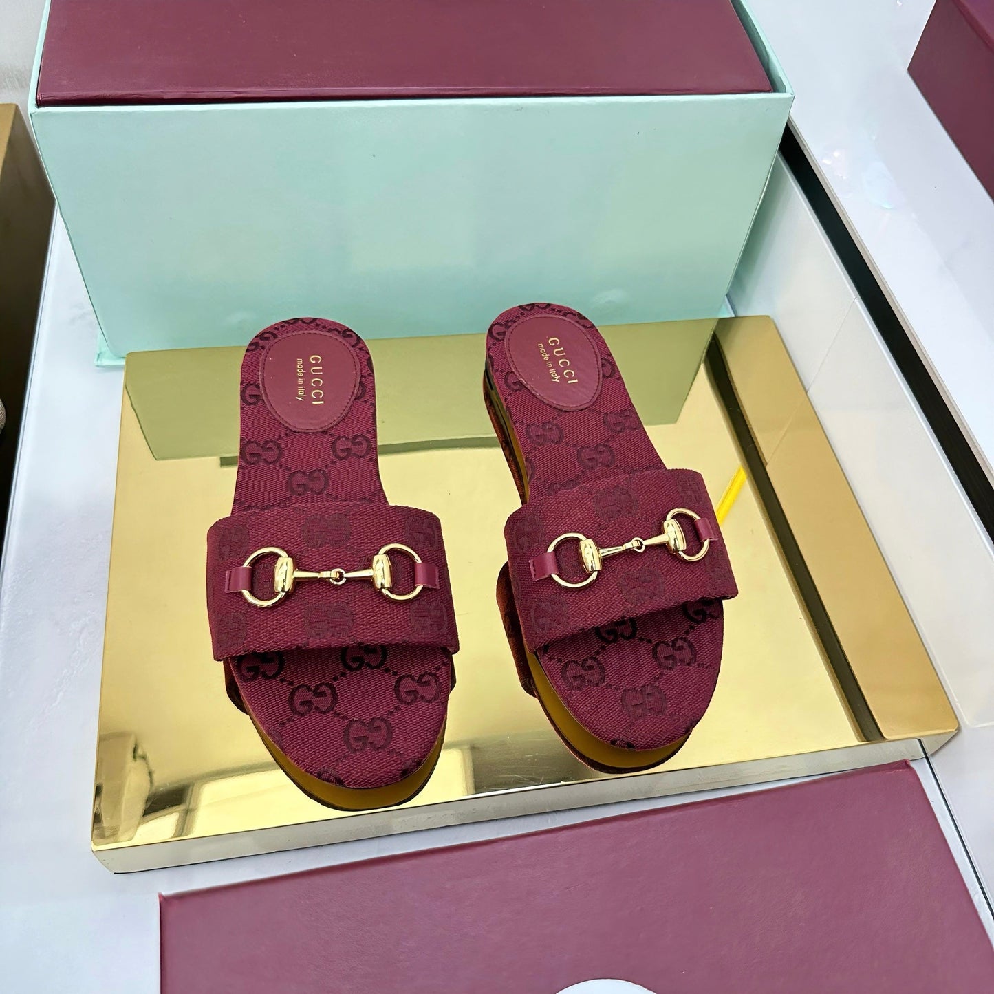 GUCCI SLIDES IN RED WITH GOLD HARDWARE