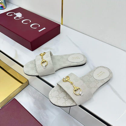 GUCCI SLIDES IN IVORY WITH GOLD HARDWARE