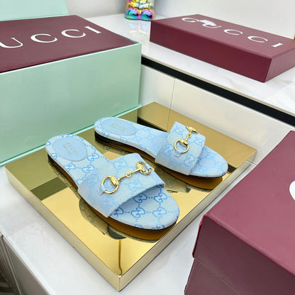 GUCCI SLIDES IN BLUE WITH GOLD HARDWARE
