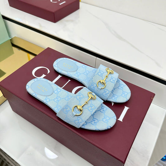 GUCCI SLIDES IN BLUE WITH GOLD HARDWARE
