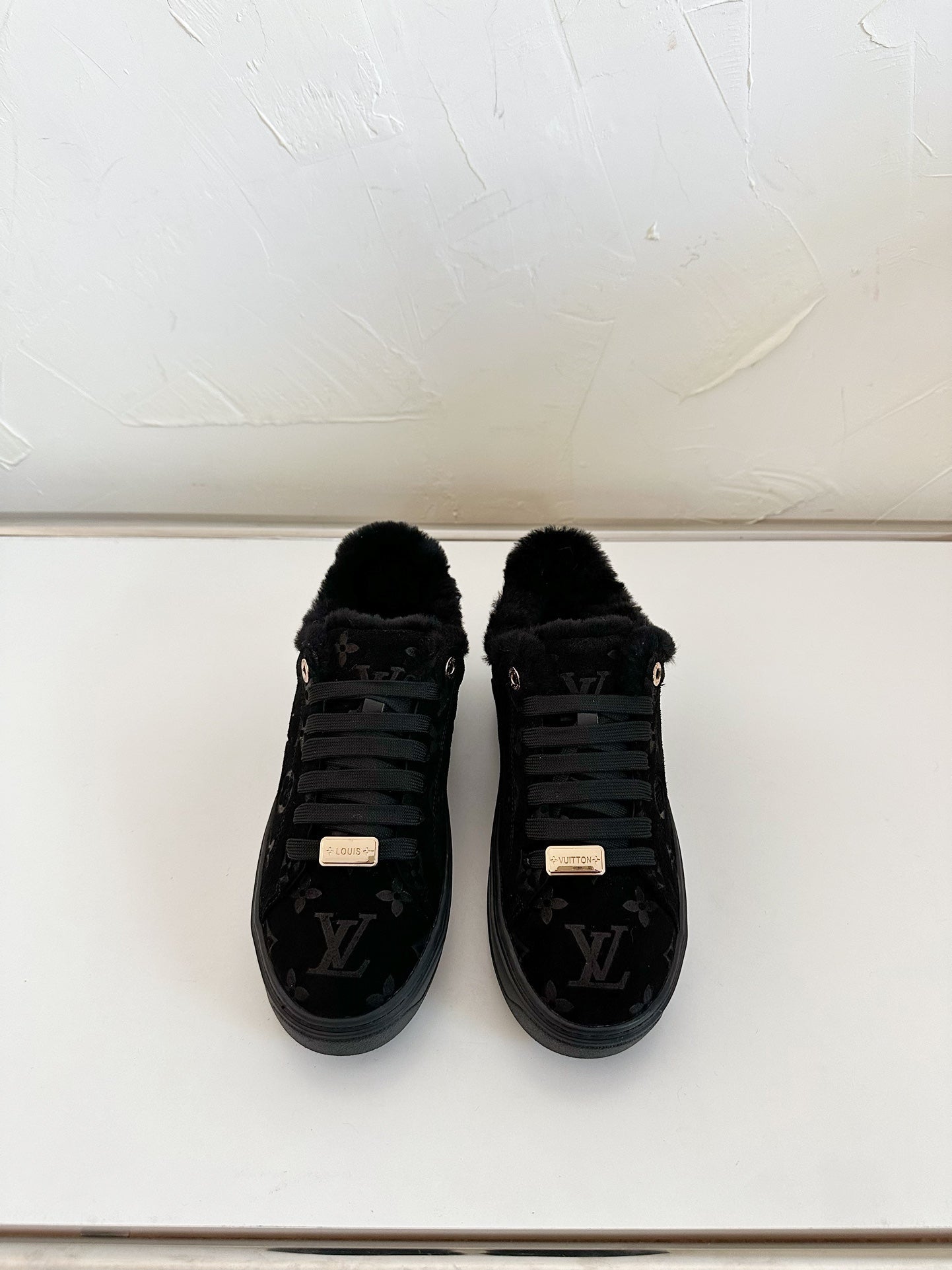 LOUIS VUITTON TIME OUT SNEAKER IN BLACK MONOGRAM EMBOSSED SUEDE WITH FLEECE LINING