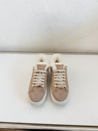 LOUIS VUITTON TIME OUT SNEAKER IN DESERT BROWN MONOGRAM EMBOSSED SUEDE WITH FLEECE LINING
