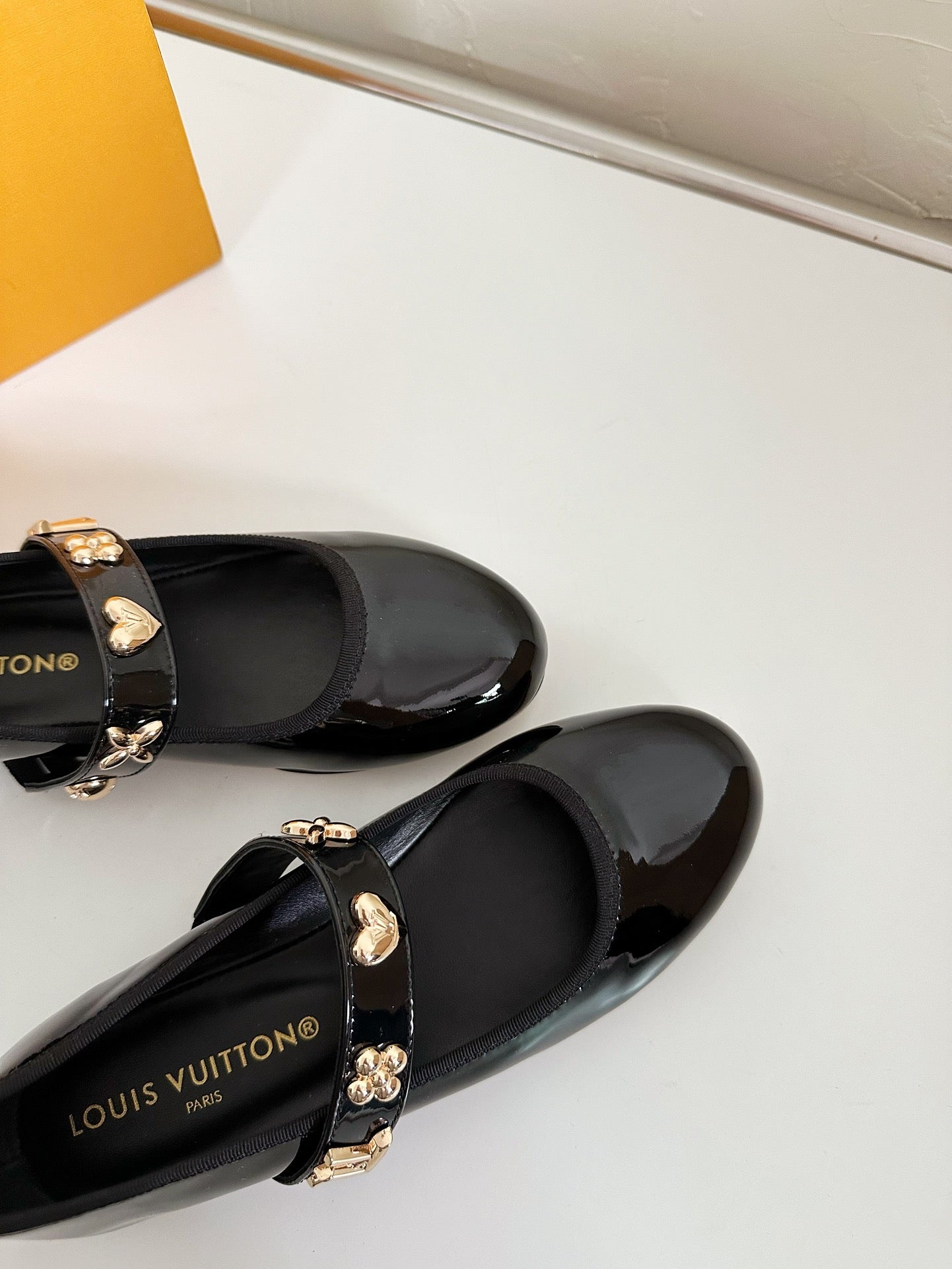 LOUIS VUITTON ROMY FLAT BALLERINA IN BLACK PATENT CALFSKIN