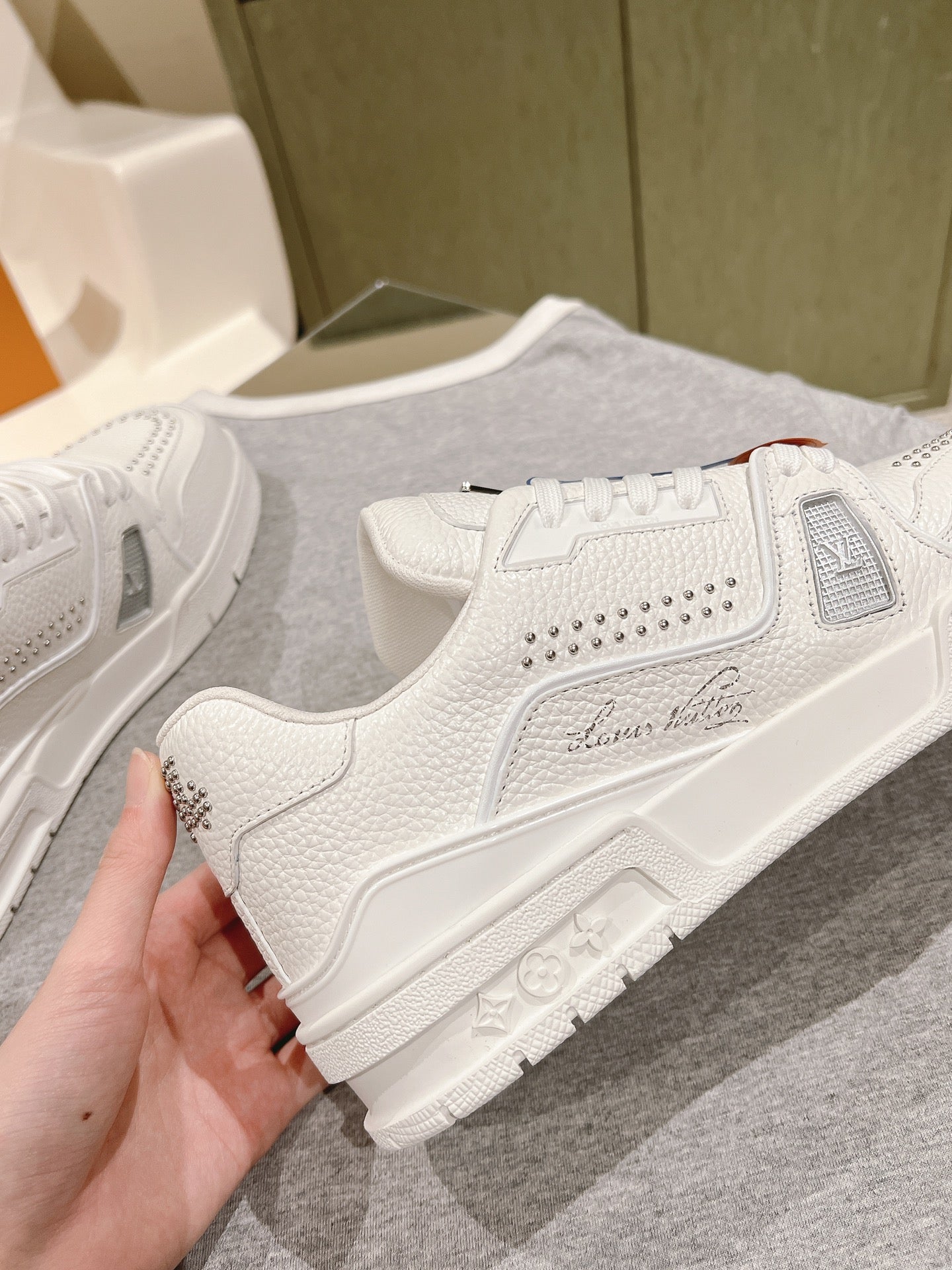 LOUIS VUITTON LV TRAINER SNEAKER IN WHITE CALFSKIN